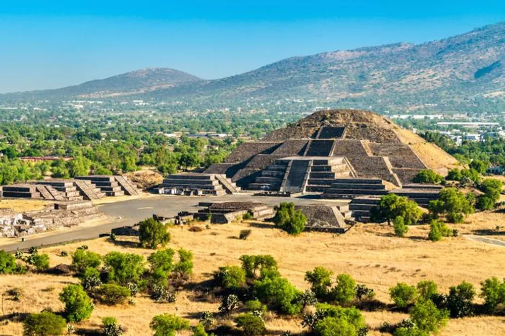 The Pyramid of the Moon and the surrounding valley from a hillside on a Teotihuacan pyramids tour