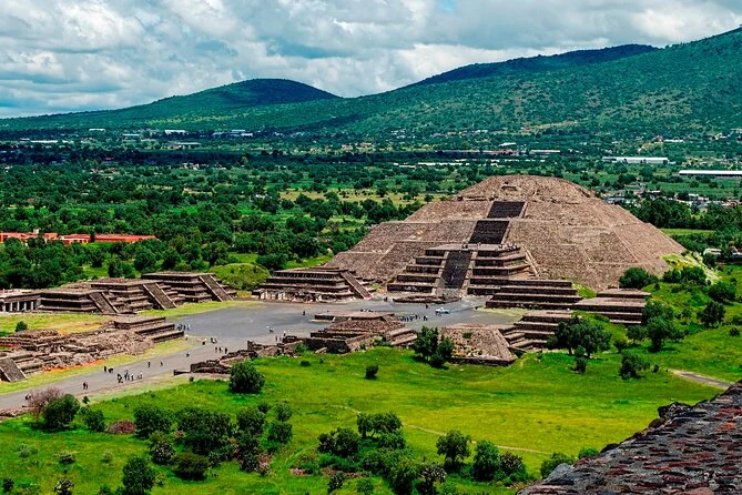 Green valley and the Pyramid of the Moon photographed in the rainy season on a Teotihuacan pyramids tour
